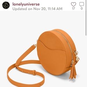 Cuyana circle crossbody bag mango